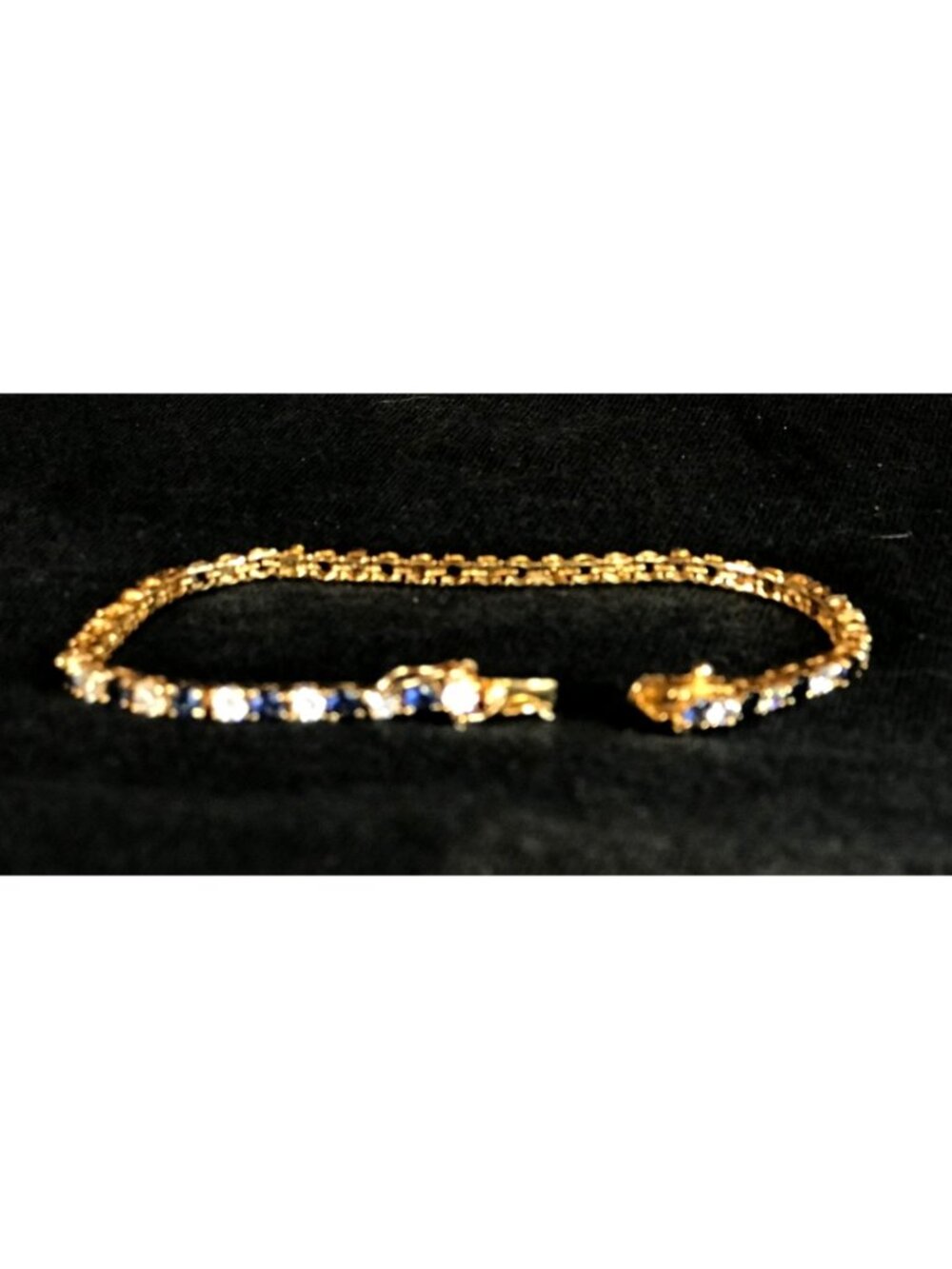 Gold Tone Tennis Bracelet with Blue and Clear Rhinestones with Safety Lock - Picture 6 of 6